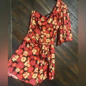 Vici red, tan, and black flower romper, one sleeve 
Size small, NWT